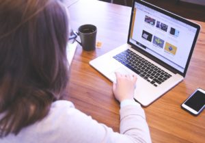 Person using macbook laptop.