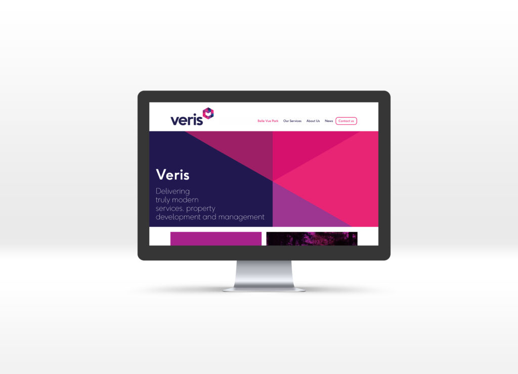 Veris homepage displayed on a Mac desktop computer