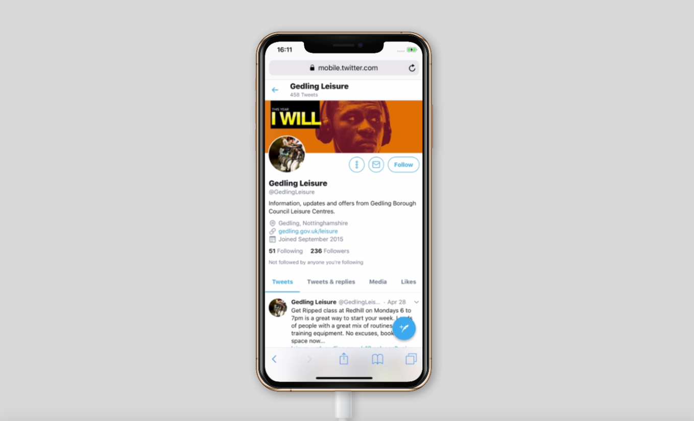 a mobile phone displaying the main social media account for Gedling Leisure