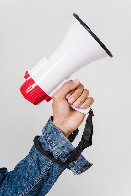 hand holding a megaphone