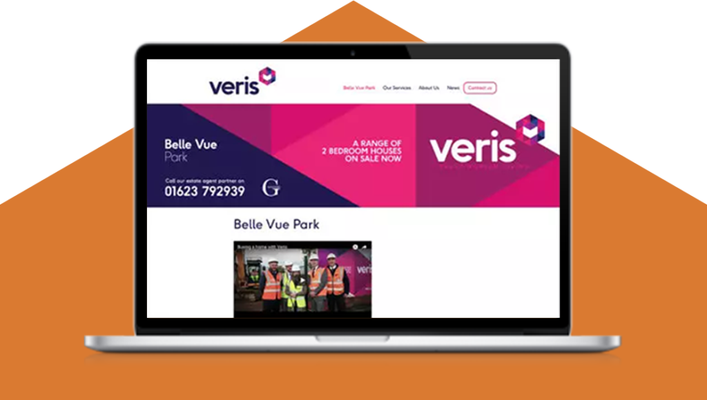 a laptop displaying a veris web page