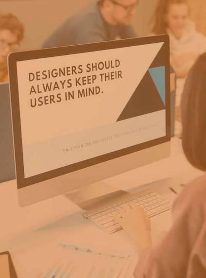 a monitor displaying the wording'designers should always keep their users in mind