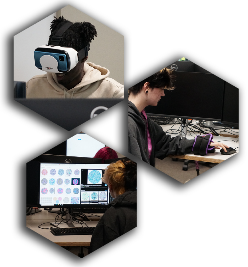 A Black student wearing a VR headset in front of a desktop monitor, another student is wearing wrist weights whilst using a mouse, and another is looking at colour blindness tests on his computer