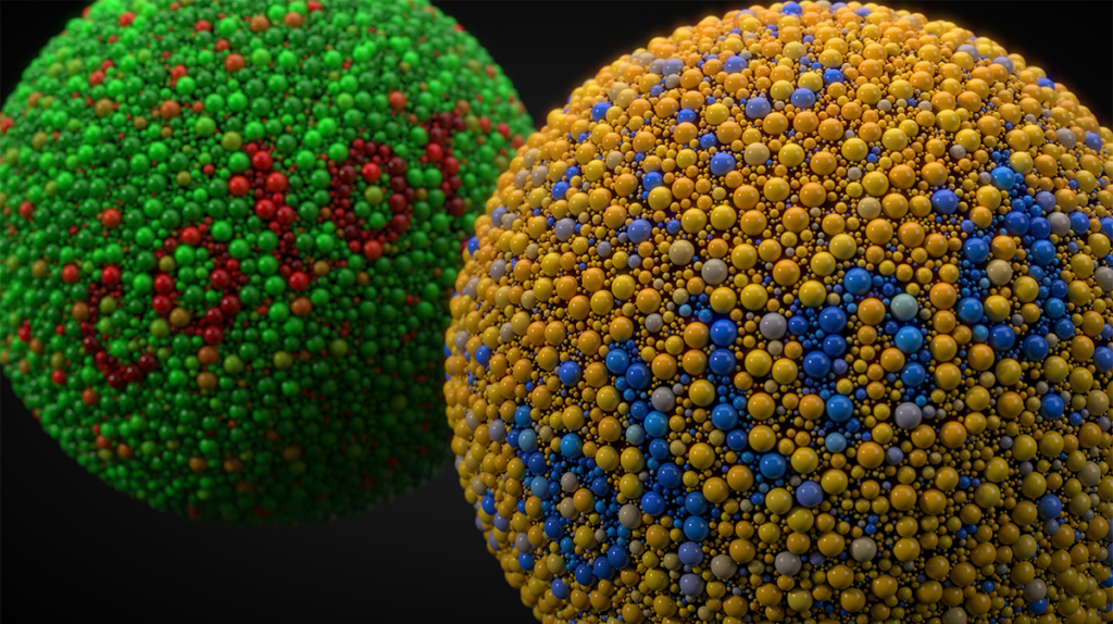 two balls with a colour blind test on them, one is green with tiny red balls spelling out the word "colour" and the other is yellow with blue balls spelling out "blind"