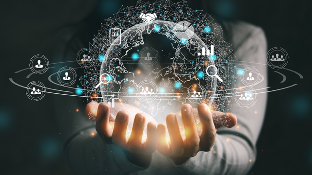 A woman's hands are held out in front of her. In her palm is a glowing globe, which is interconnected with icons that represent the world wide web.