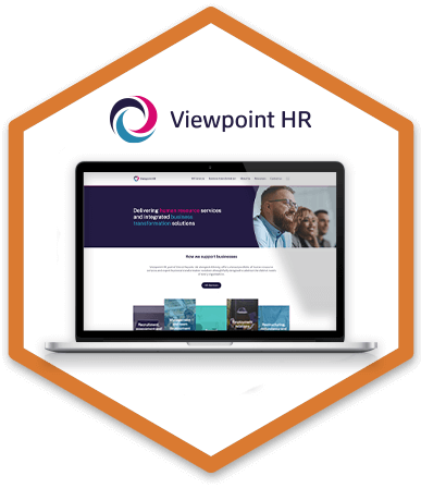 A silver laptop is displaying Viewpoint HR's homepage